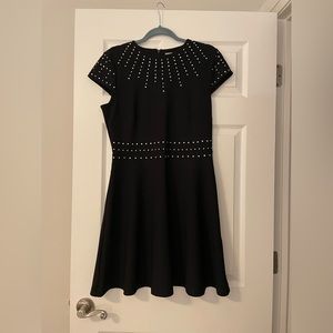 Stylish H&M dress. Knee length. Black with crystal studs. Size M. Never …